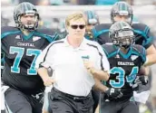  ?? CHARLES SLATE/ASSOCIATED PRESS ?? Coastal Carolina coach Joe Moglia, 51-15 in 4 seasons, will be leading his team in a big move up to the FBS level.