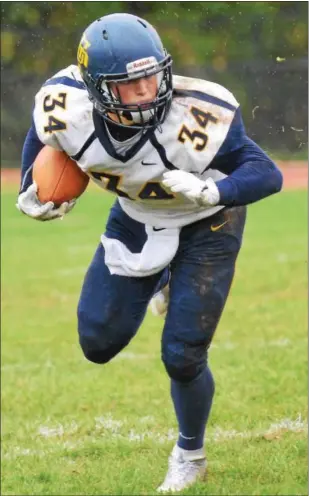  ?? SAM STEWART — DIGITAL FIRST MEDIA ?? Upper Perkiomen’s Tyler Whary looks for open space during the first half of the Indians’ 43-16 victory Saturday.