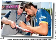  ?? CHRISTOPHE­R DEAN/SCANTECH ?? Meet and greet: Amir signs autographs for Essex fans yesterday