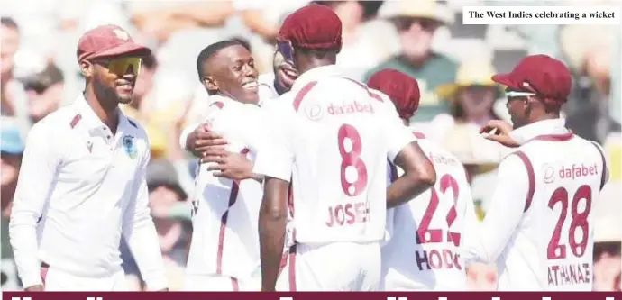  ?? ?? The West Indies celebratin­g a wicket