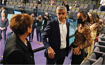  ?? Photo — AFP ?? Sadiq with his family after being declared the winner of the London Mayoral election at City Hall in London.