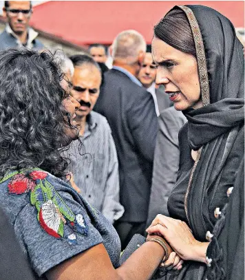  ??  ?? Jacinda Ardern, the New Zealand prime minister, meets relatives and survivors at Canterbury Refugee Centre in Christchur­ch yesterday