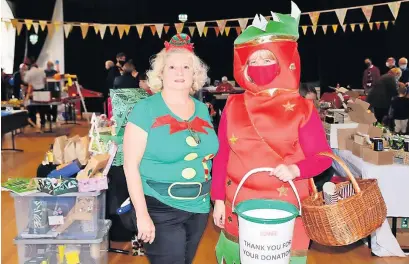  ?? ?? Festive spirit Patricia Robertson of the Christmas Lights Committee and Roseanne Keith of Rosie’s Wee Rascals