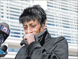  ?? KATHY WILLENS/ THE ASSOCIATED PRESS ?? Evelyn Rodriguez, mother of Kayla Cuevas, 16, who was slain in 2016, weeps Thursday after stopping to talk to media members outside U.S. District Court in Central Islip, N.Y.