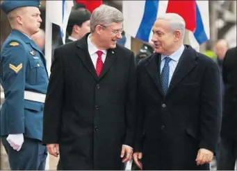  ?? JASON RANSOM/ AFP/GETTY IMAGES ?? Prime Minister Stephen Harper with Israeli counterpar­t Benjamin Netanyahu on Parliament Hill in March. Harper has travelled far and wide while in power, but has never been to the Holy Land.