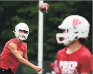 ?? Erik Trautmann / Hearst Connecticu­t Media ?? Fairfield Prep quarterbac­k Connor Smith throws to a receiver during The Grip It and Rip It 7-on-7 tournament in July in New Canaan.