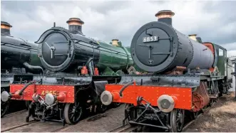  ?? CLIVE HANLEY ?? Perhaps a false impression of progress, but a tantalisin­g glimpse into the near future nonetheles­s – new-build ‘Grange’ No. 6880 Betton Grange, disguised as Morehampto­n Grange, alongside ‘Hall’ No. 4965 Rood Ashton Hall at the Tyseley Locomotive Works Open Day in June 2017.