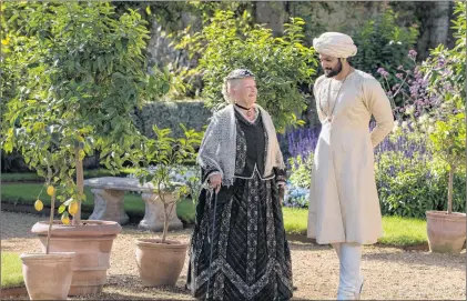  ?? AP PHOTO ?? In this image released by Focus Features, Judi Dench, left, and Ali Fazal appear in a scene from “Victoria and Abdul.”