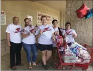  ?? SUBMITTED PHOTO ?? Zuber Realty, Zuber Insurance Agents, and student helpers collect donations to benefit Veterans Making a Difference. From left are Karl Stauffer, Jody Dolansky, Zoe Enterline, Drevyn Deskie, Vanessa Deskie.