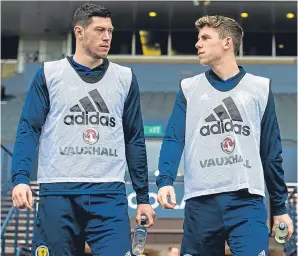  ??  ?? Reds in dark blue: Aberdeen’s Ryan Christie, right, and Scott McKenna