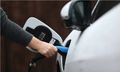  ??  ?? The CCC found it is cheaper to transition to electric cars than to continue with petrol and diesel vehicle. Photograph: Andrew Matthews/PA