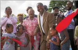  ?? RICK KAUFFMAN — DIGITAL FIRST MEDIA ?? Mayor Thaddeus Kirkland is joined by members of city council, city government and members and children of the Chester community at the ribbon cutting at the newest playground in Chester.