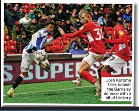  ?? ?? Josh Koroma tries to beat the Barnsley defence with a bit of trickery