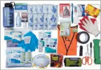  ?? VLES VIA AP ?? This June 2018 photo provided by VLES shows contents of the company’s GO-bag. The bag is a best-in-class fully-stocked emergency bag that has things you could need in case of an emergency and has plenty of room for the personal items you’ll need.