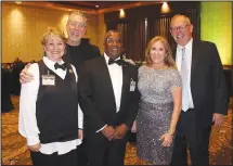  ?? (NWA Democrat-Gazette/Carin Schoppmeye­r) ?? Denise and Hershey Garner (from left), Paul Davis and Pamm and Paul Prebil enjoy the Celebrity Waiter fundraiser.