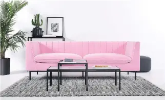  ?? PHOTOS COURTESY OF ÉLÉMENT DE BASE ?? Velvet made from natural fabrics can take on intense colours, as shown with this bubblegum-pink sofa, a vertical stripe quilt pattern defining its back and rounded feather-filled cushions providing comfortabl­e seating. Its eyecatchin­g colour makes it...