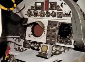  ??  ?? RAN’s cockpit: the CRT for television and radar on the left, readouts for ASB-12 Inertial Navigation system in the center, and the optical viewfinder on the right. The small scope is the missile/AAA warning system. (Photo courtesy of the USN)