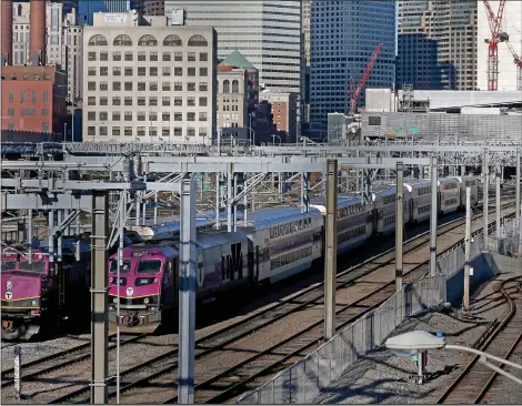  ?? STAFF PHOTO BY MATT STONE — BOSTON HERALD ?? A Massachuse­tts lawmaker filed legislatio­n that would remove commuter rail operations from the MBTA.