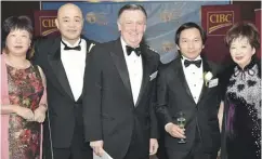  ??  ?? From left, Yang-hai Wang, Royson Ng, Peter Lawler, Alan Kwong and Anita Lee at the ACCE gala.
