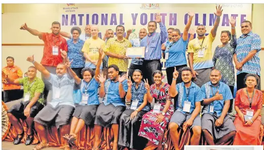  ?? Picture: JONA KONATACI ?? Youths of the Western Division with Minister for Youth and Sports Parveen Kumar during the National Youth Climate Action Summit at the Grand Pacific Hotel last week.