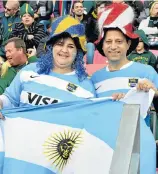  ?? Picture: EUGENE COETZEE Picture: EUGENE COETZEE ?? WAVING THE OTHER SIDE’S FLAG: Argentine supporters Marilu and Arnesto Zanetto supported the South American team when it faced the Springboks last weekend at the Nelson Mandela Bay Stadium