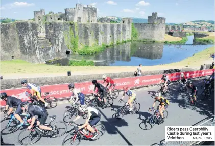  ?? MARK LEWIS ?? Riders pass Caerphilly Castle during last year’s Velothon