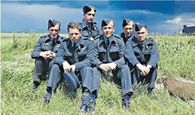  ?? ?? Johnson, above, first left, with his crewmates, and right, in 1962: when he was appointed MBE in 2017, he insisted, ‘It is the squadron that is being honoured with this, not me’