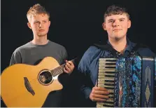  ?? ?? Highland folk duo Càrnan – guitarist and singer Arthur Brook, left, and accordioni­st Louden Mackay.