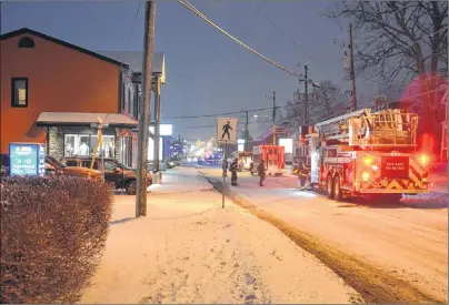  ?? RYAN ROSS/THE GUARDIAN ?? One of the calls the Charlottet­own Fire Department responded to during the storm was at 294 University Ave. The call came in at 6:55 p.m. that there was an active fire on a rooftop, but firefighte­rs found nothing and deemed it to be a false alarm.