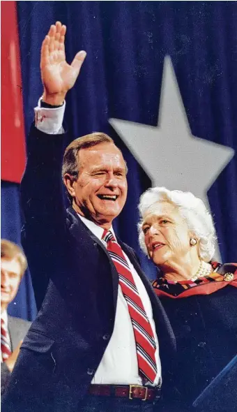 ?? Chronicle file ?? President-elect George Bush, with his wife, Barbara, acknowledg­es the crowd on Nov. 8, 1988, at the George R. Brown Convention Center after he won election as the 41st president of the United States.