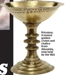  ??  ?? Priceless: A looted golden crown and chalice from Abyssinia, now held by the V&amp;A