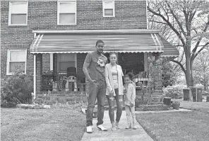  ?? PHOTOS BY KYLE BAGENSTOSE/ USA TODAY ?? Tony Murray, wife Leah Brown, and daughter Tierney stand outside their Northwest Baltimore home. The family has experience­d numerous sewage backups through a shower and a toilet in their finished basement in recent years, costing them thousands of dollars.