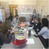  ??  ?? Teachers and staff from St. Mary School enjoy some treats sent to the school by the board members of the Holy Trinity Catholic School Division during Teacher/Staff Appreciati­on Week in Saskatchew­an.