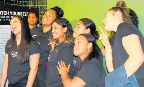  ?? Photo / Judith Lacy ?? Members of the Black Ferns squad have fun with the photo booth at the Herstory of Women’s Rugby exhibition.