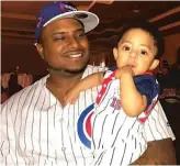  ?? SUPPLIED ?? Friends said this photo shows Cypruss Harris and his son, Cypruss Jr. Harris was shot to death Dec. 5 at the Presidenti­al Inn motel in Lyons.