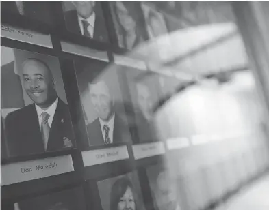  ?? SEAN KILPATRICK / THE CANADIAN PRESS ?? A portrait of Senator Don Meredith is displayed on the wall alongside fellow senators on Parliament Hill in Ottawa on Tuesday, May 9, 2017. Disgraced Sen. Don Meredith is resigning from the Senate rather than wait to see if his col-
