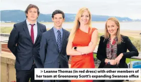  ??  ?? &gt; Leanne Thomas (in red dress) with other members of her team at Greenaway Scott’s expanding Swansea office