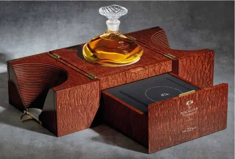  ??  ?? The Macallan 72 Year Old in its decanter by Lalique and unique presentati­on box
