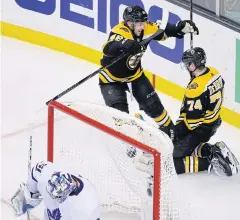  ?? USA TODAY SPORTS ?? Bruins left wing Jake DeBrusk, right, celebrates with defenceman Matt Grzelcyk after scoring against the Maple Leafs.