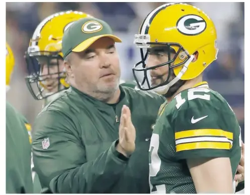  ?? Tony Gutierrez/Associated Press ?? Packers coach Mike McCarthy — a Greenfield native — and his quarterbac­k, Aaron Rodgers, seek their second Super Bowl trip today in Atlanta.