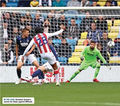  ?? ?? IN THE LEAD: Romaine Sawyers scores for Stoke against Millwall.