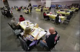  ?? MARK HUMPHREY — THE ASSOCIATED PRESS ?? Medical workers give Pfizer’s COVID-19vaccine Friday in Nashville, Tenn.