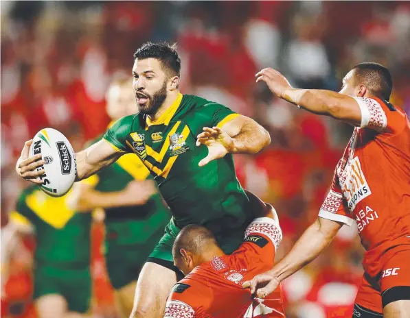  ?? Picture: ANTHONY AU-YEUNG/GETTY ?? James Tedesco of Australia on the charge during the Test match between Tonga and Australia in New Zealand yesterday