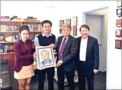  ?? FACEBOOK ?? Dara Nita (left) poses for a photo with Chea Youhorn (right) and Hong Lim. Nita fled Cambodia after a Cambodian artists’ associatio­n accused her of using singers’ popularity to stoke the opposition movement in Australia.