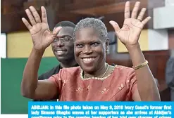  ??  ?? ABIDJAN: In this file photo taken on May 9, 2016 Ivory Coast’s former first lady Simone Gbagbo waves at her supporters as she arrives at Abidjan’s courthouse prior to the opening hearing of her trial over charges of crimes against humanity for her alleged role in the 2010 electoral violence. —AFP