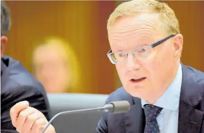  ?? Photo / bloomberg ?? Adrian Orr’s (below) shock cash rate drop and warnings about negative interest rates have left Reserve Bank of Australia governor Philip Lowe squirming in the spotlight.