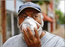  ?? CURTIS COMPTON / CCOMPTON@AJC.COM ?? Vietnam veteran Robert Ingram, 74, in downtown Sparta: “I think it’s more than serious. It’s a matter of life and death is what it is.” African Americans are among the groups that seem to be hit hardest by the pandemic.