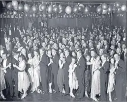  ??  ?? Guests get in the swing of things during a charity ballroom dance held aboard the RMS Berengaria in April 1929