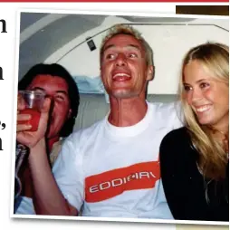  ?? ?? Drink up: Eddie Irvine with a business partner (left) and his girlfriend on a private jet in 1999