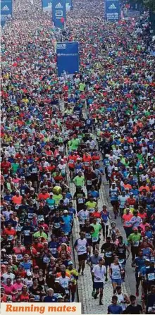  ?? AP ?? Runners start the 43rd Berlin Marathon in front of the Brandenbur­g Gate in Berlin, Germany, yesterday.